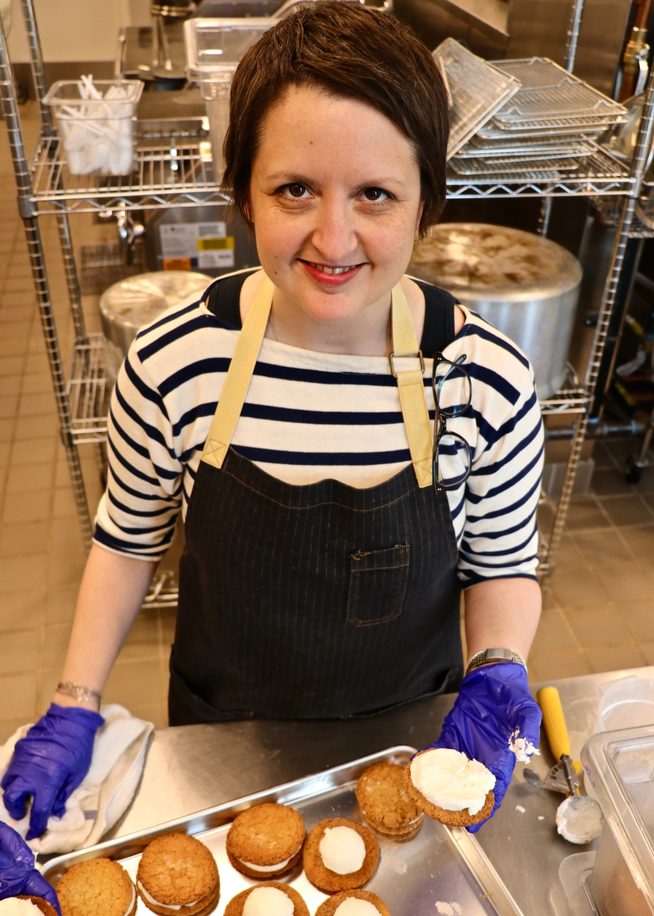 Rebekah Turshen finishing her buttermilk cornmeal cookie ice cream sandwiches.