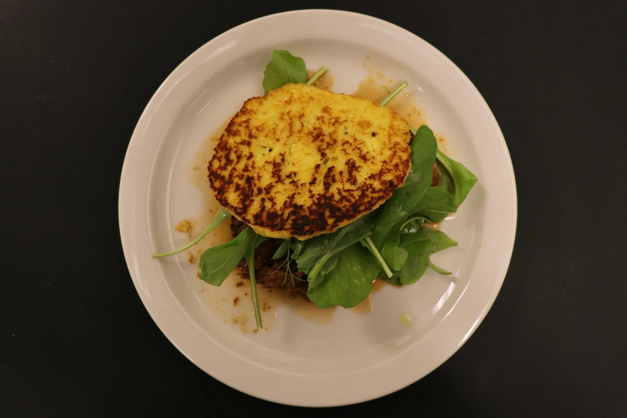 Tandy’s dish: Sour Corn Cake, Bear Creak Beef Sugo and Spring Vegetables