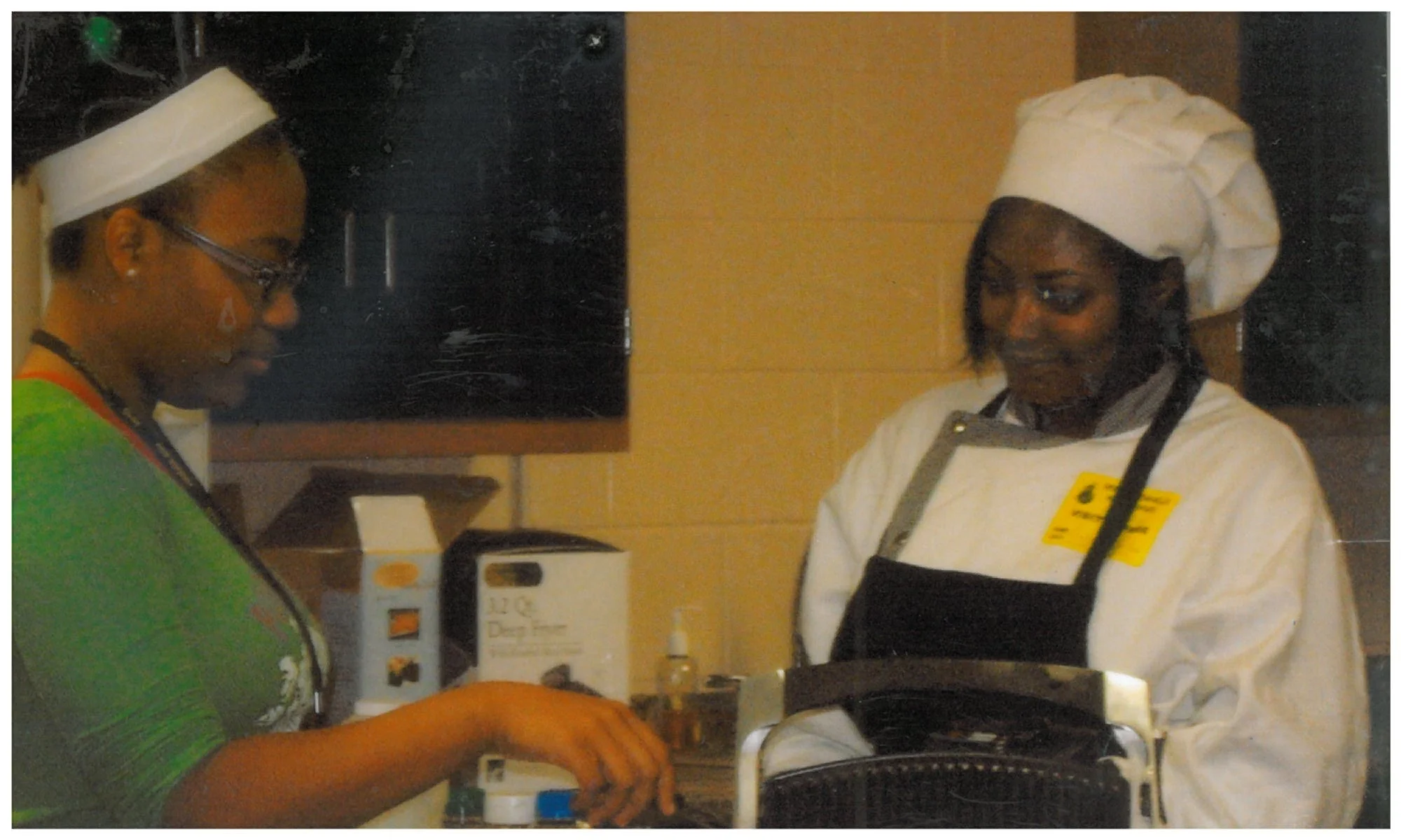 Bianca (right) at culinary school in Atlanta.