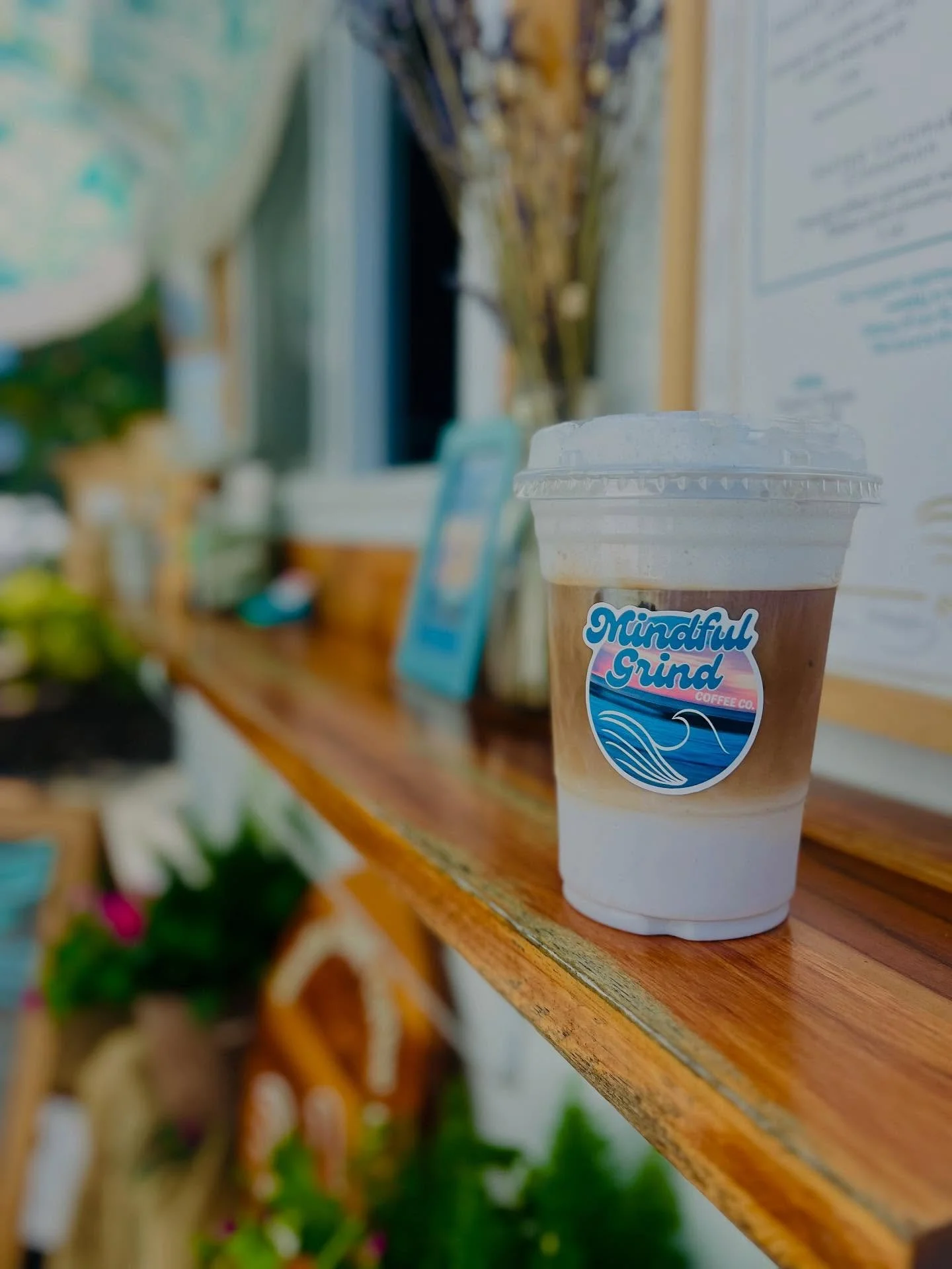 Our layered blueberry vanilla latte with blueberry sweet cream is the perfect summer drink. Forget about the heat and sip on this delicious iced latte.