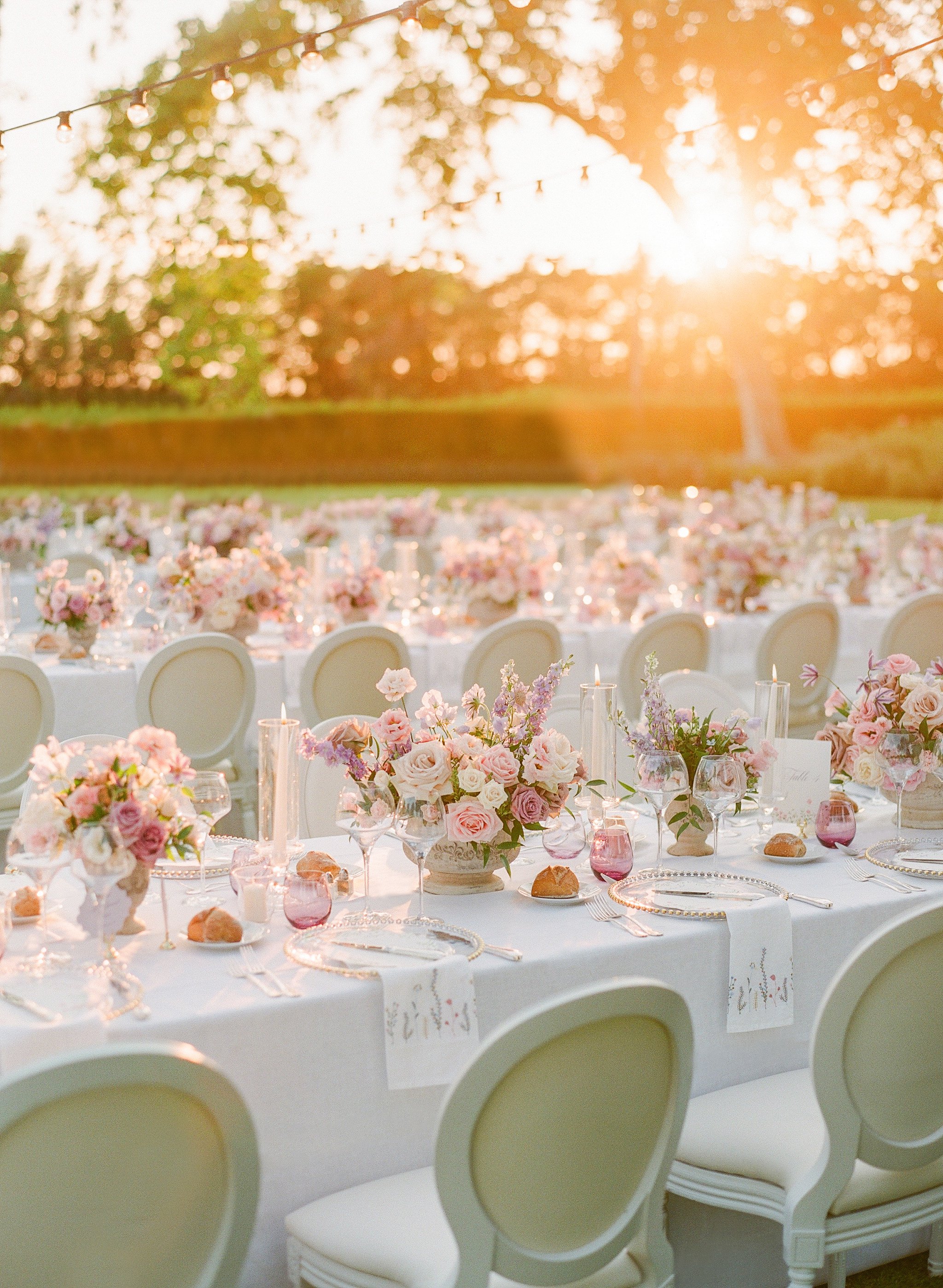 Dreamy-wedding-dinner-pastel-colors-sunset-wedding-golden-hour-chateau-wedding-south-of-france-wedding-dinner-decoration-inspiration-luxury-wedding-design.jpg