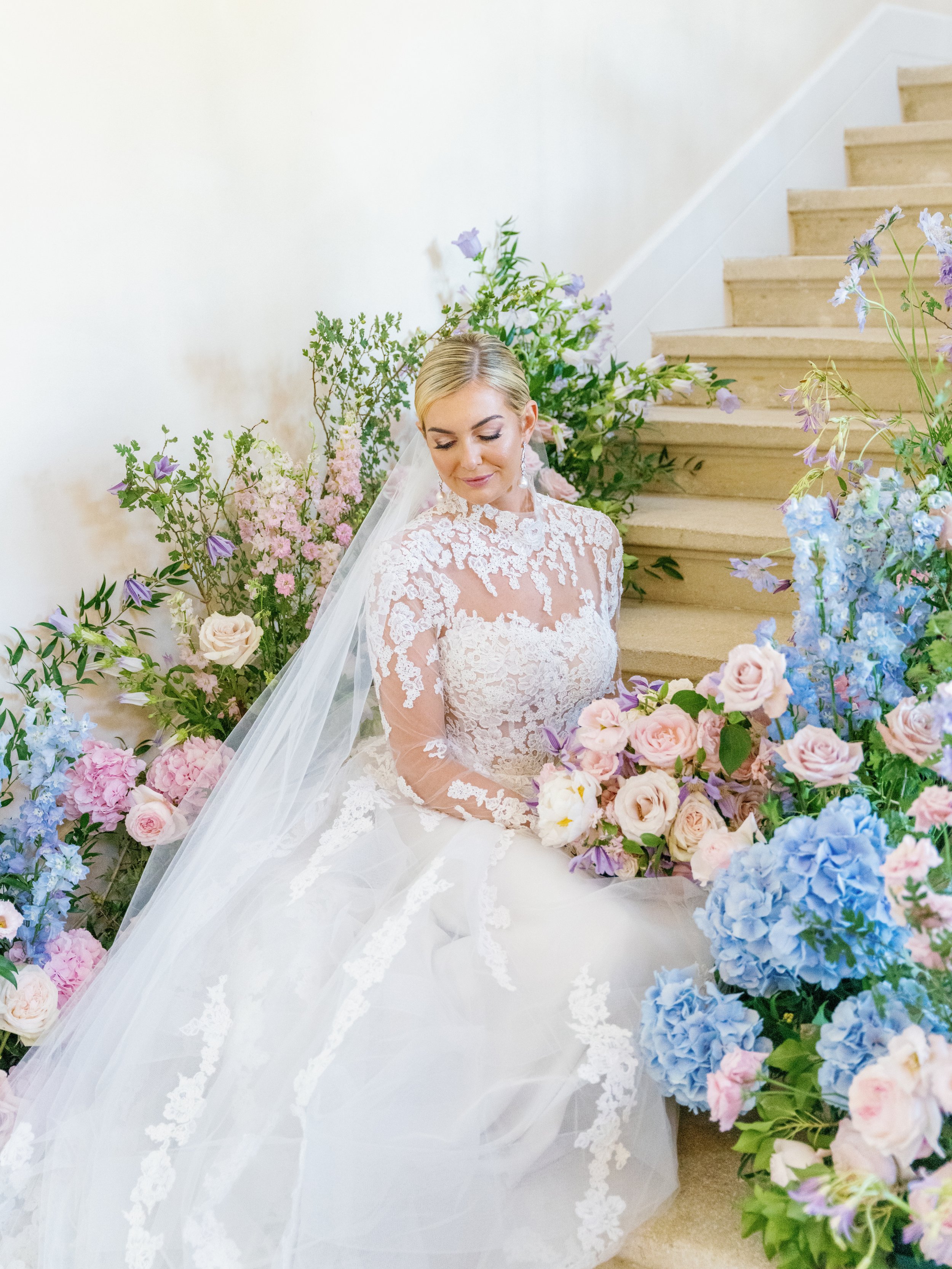 Bride-first-look-wedding-stairs-luxurious-floral-design-colorful-wedding-romantic-venue-Chateau-de-Tourreau-Provence-South-of-France.jpg