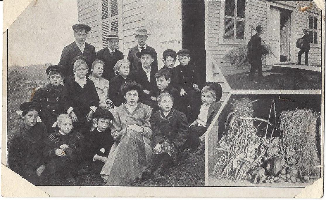 A Postcard from 1906 with pictures of the East Lansing Hall and School.