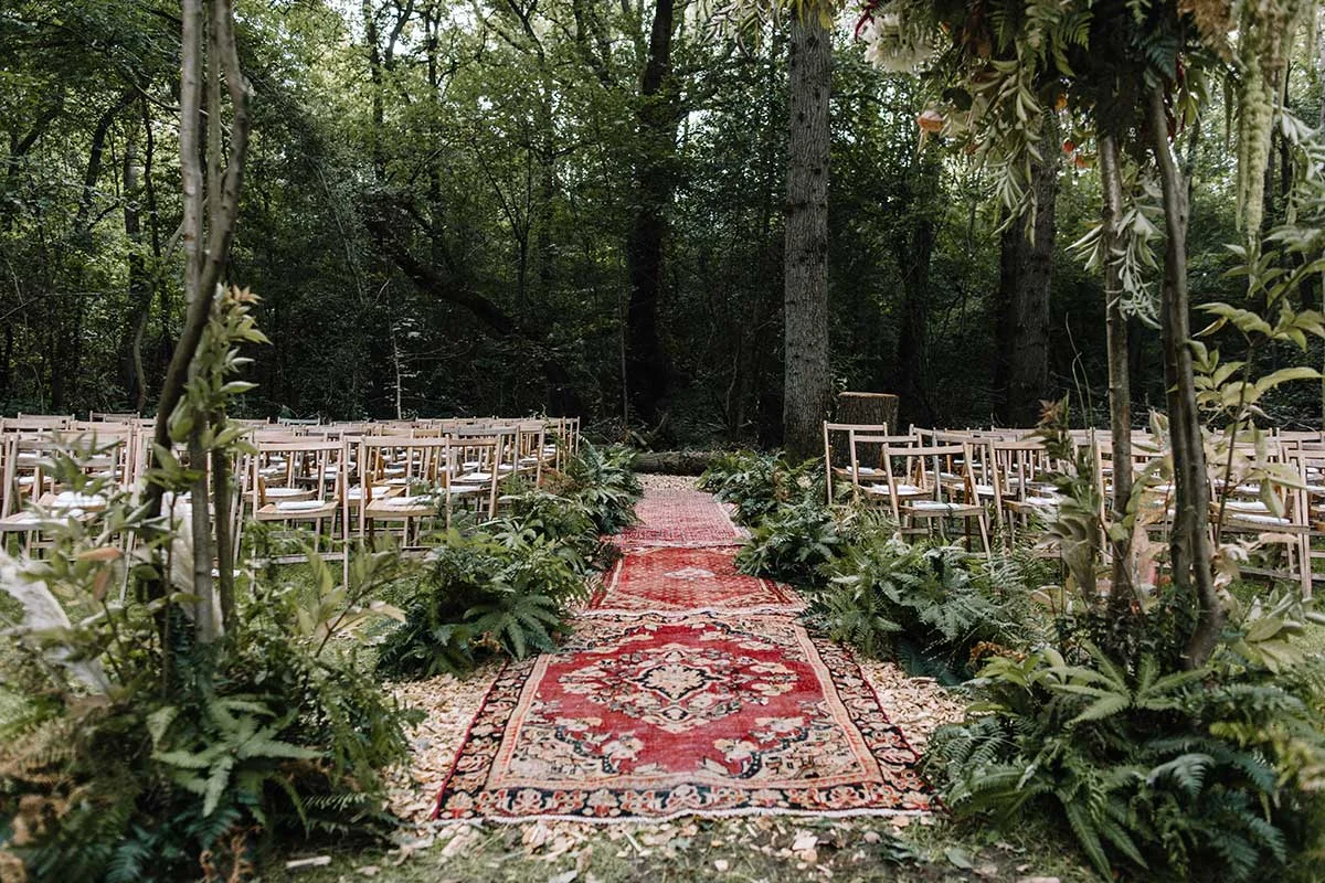 autumnal wedding with woodland ferns and foliage arch