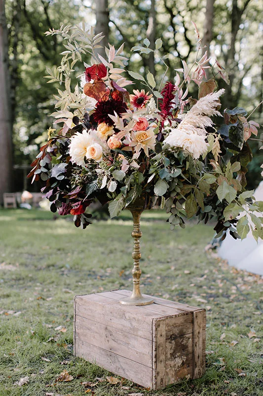 unique large urn arrangement for a woodland wedding