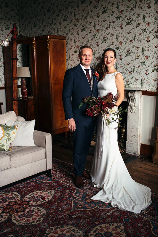 Vervain Unique Devon Wedding in Dark and Moody colours with autumnal blooms and silk ribbon