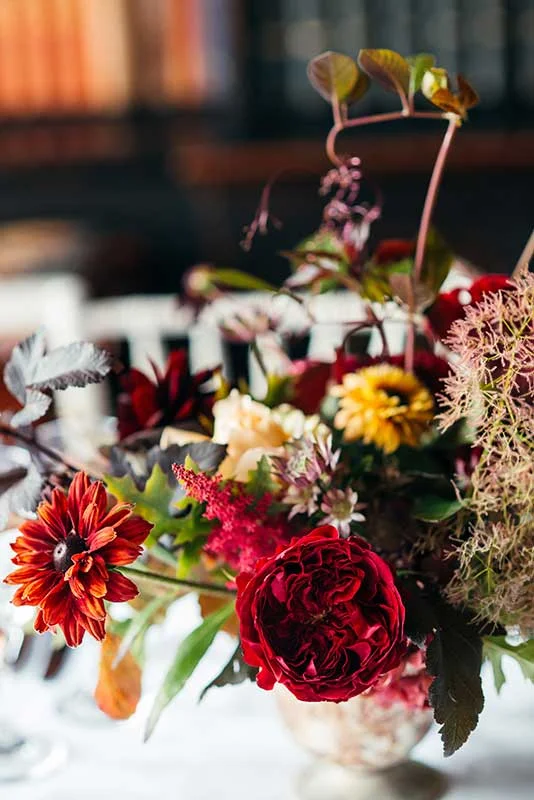 Vervain Unique Devon Wedding in Dark and Moody colours with autumnal blooms and silk ribbon