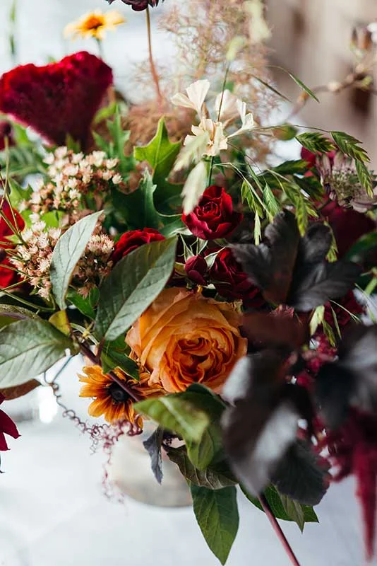 Vervain Unique Devon Wedding in Dark and Moody colours with autumnal blooms and silk ribbon