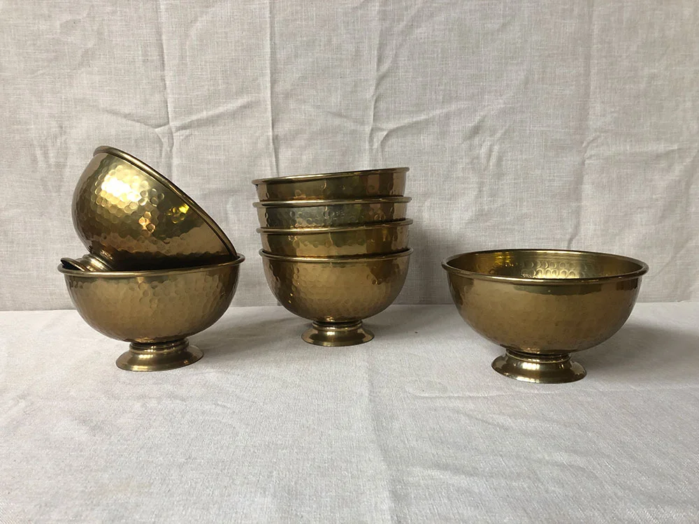 Large hammered metal gold footed bowls