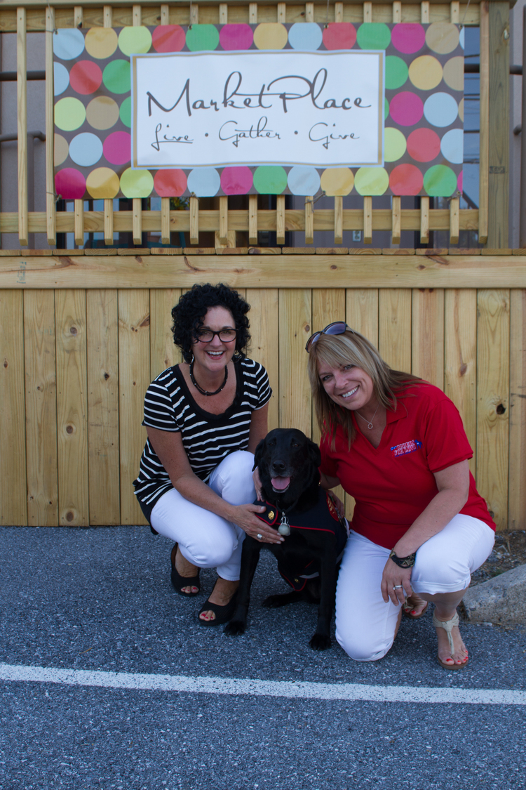 Market Place owner Patti Santagelo of Hershey, just had to meet and pose for a picture with special guest Sgt. Rey and OFL's Executive Director.