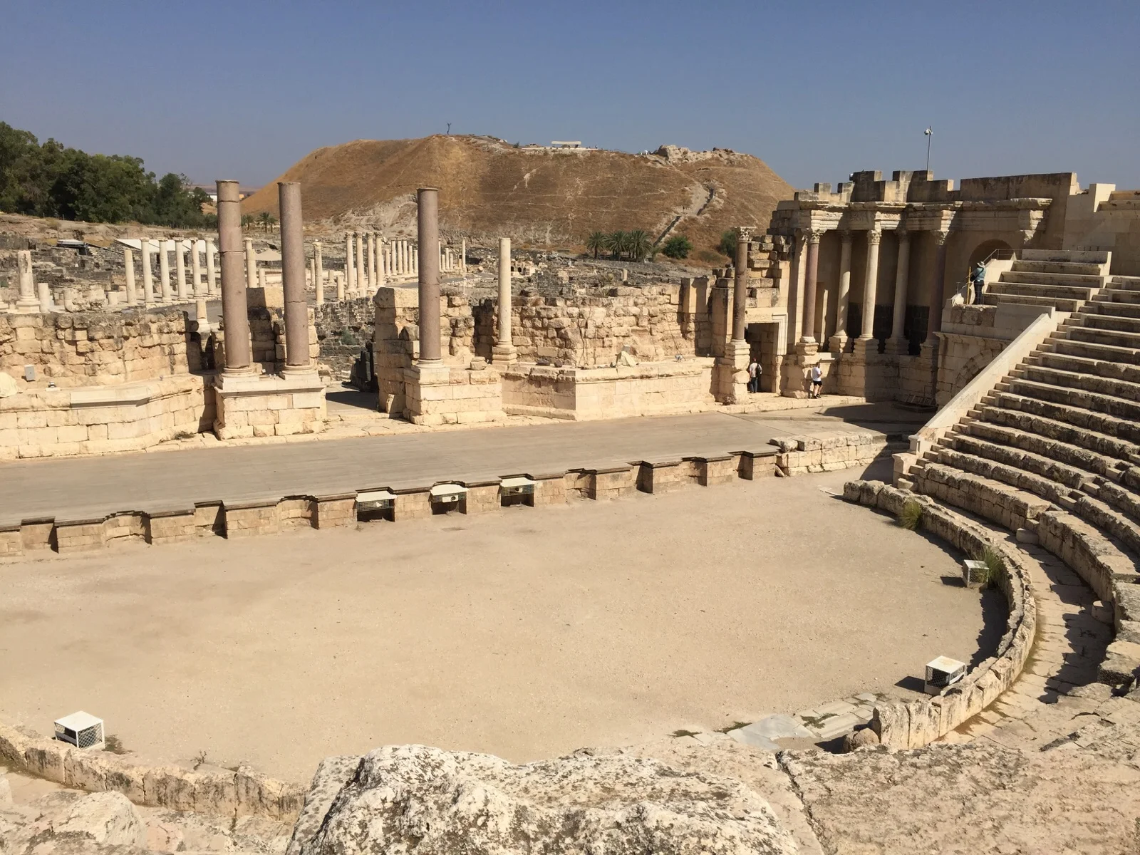 A view of the Beth-shan tel. The photo was taken from inside the theater looking north. You can see the columns that line the main street behind the theater stage on the left.