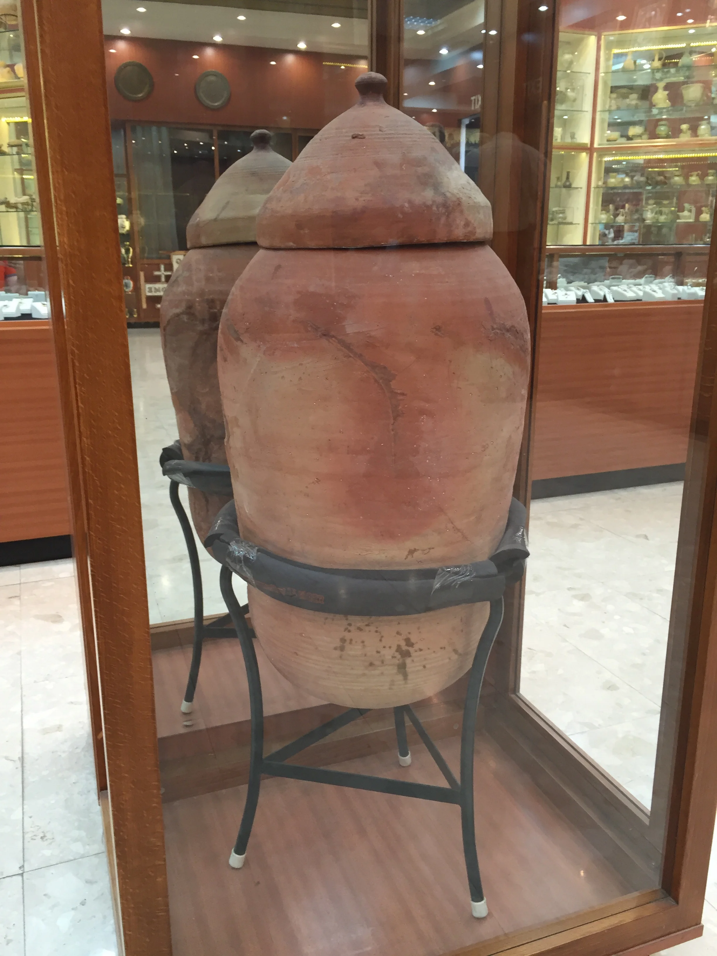 This photograph is connected to our trip yesterday to Qumran. In Bethlehem, the family of the antiquities dealer who purchased the first Dead Sea Scrolls from the Beduins is still in posession of the largest of the 4 remaining Qumran pots in the world! He gave us a brief history of his family's connection to the scrolls, and let us photograph the pot which is on display in his shop.