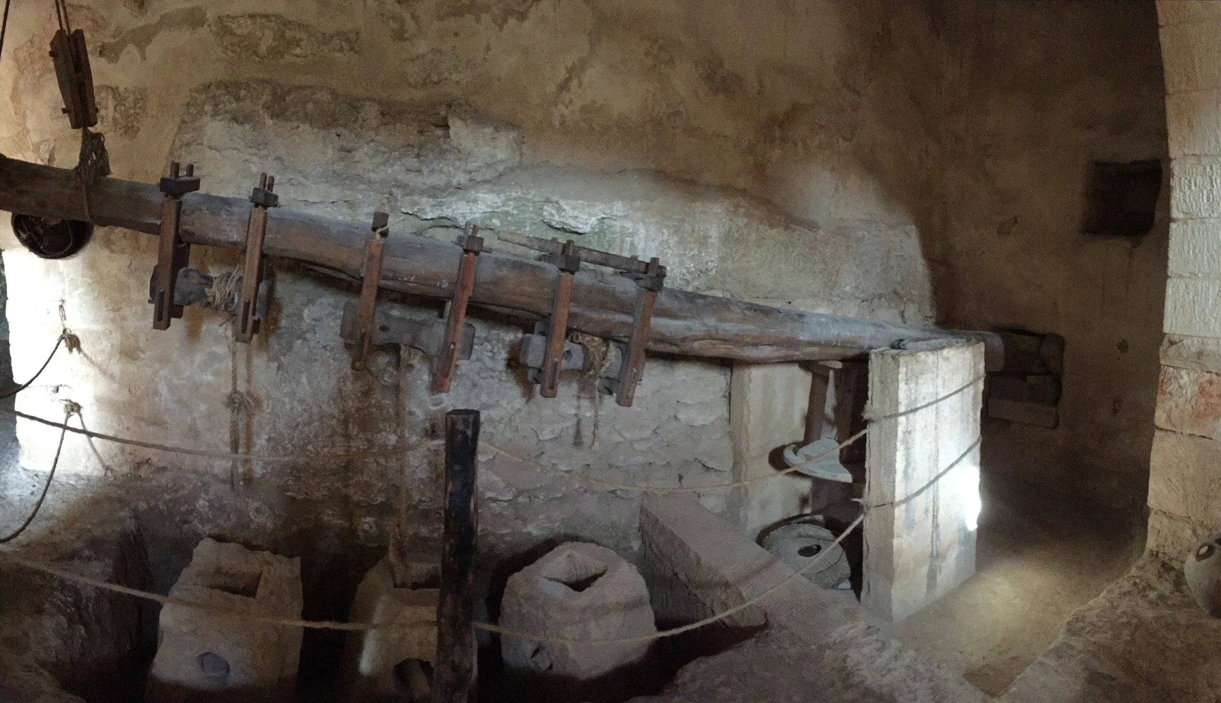 Weight assisted oil press.