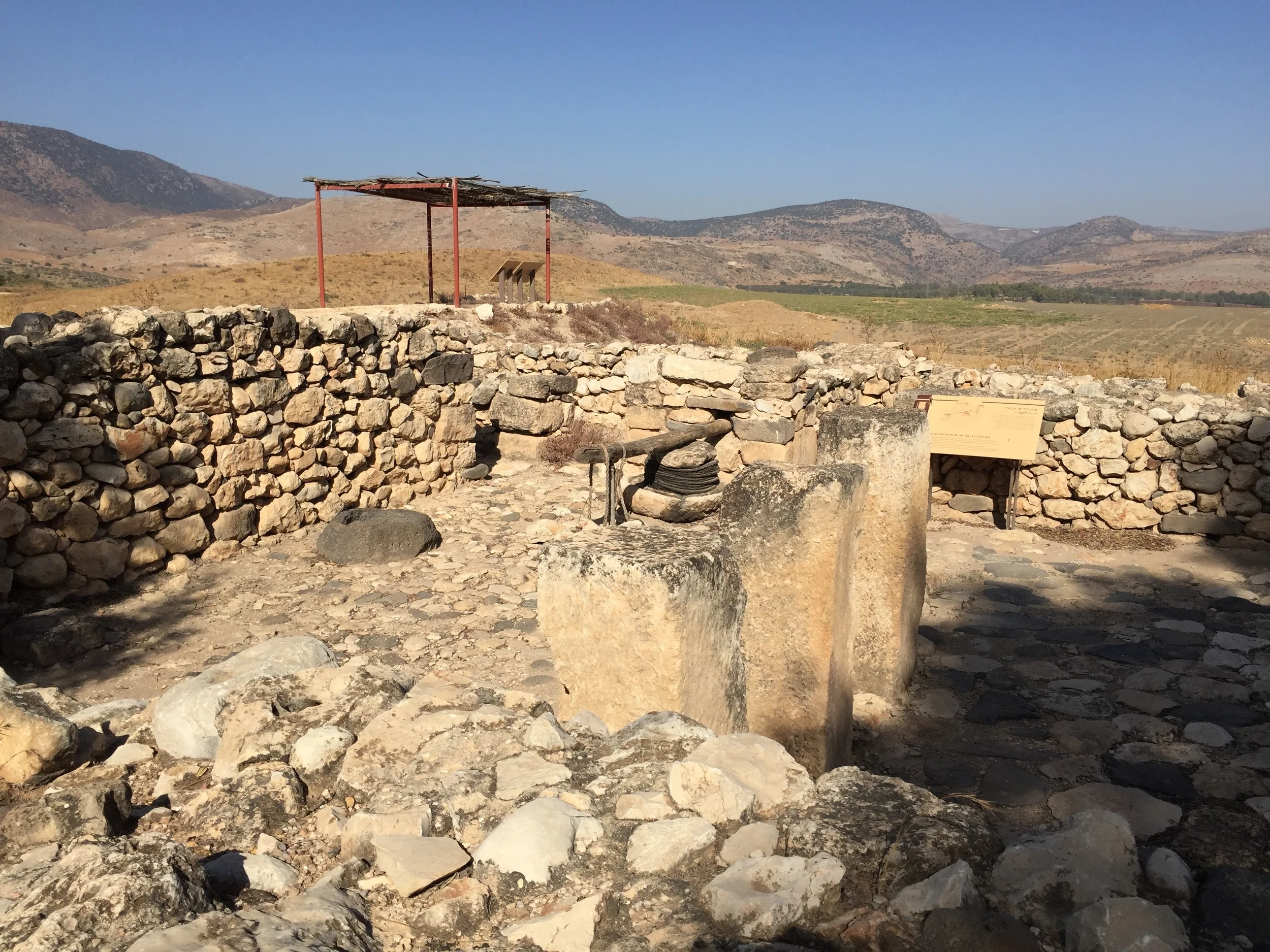 An olive press with baskets at Tel Hazor. See the pictures of Nazareth Village for another example.