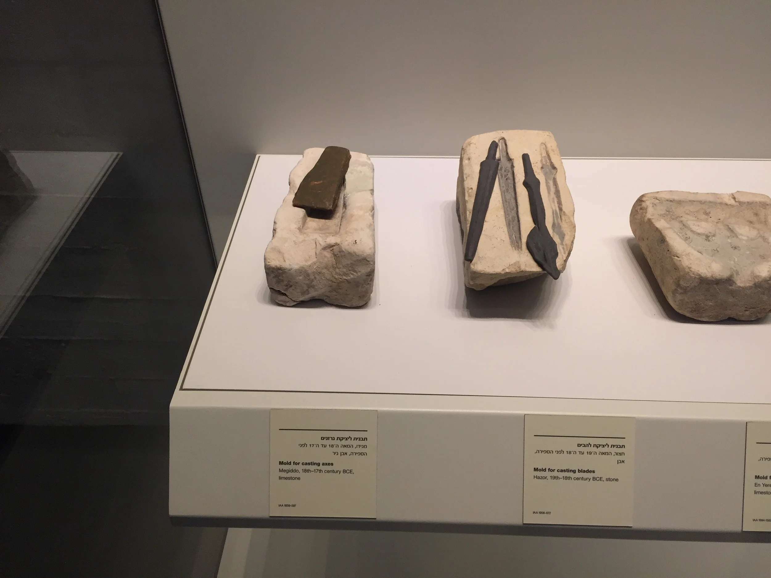 Molds for casting axes and blades.