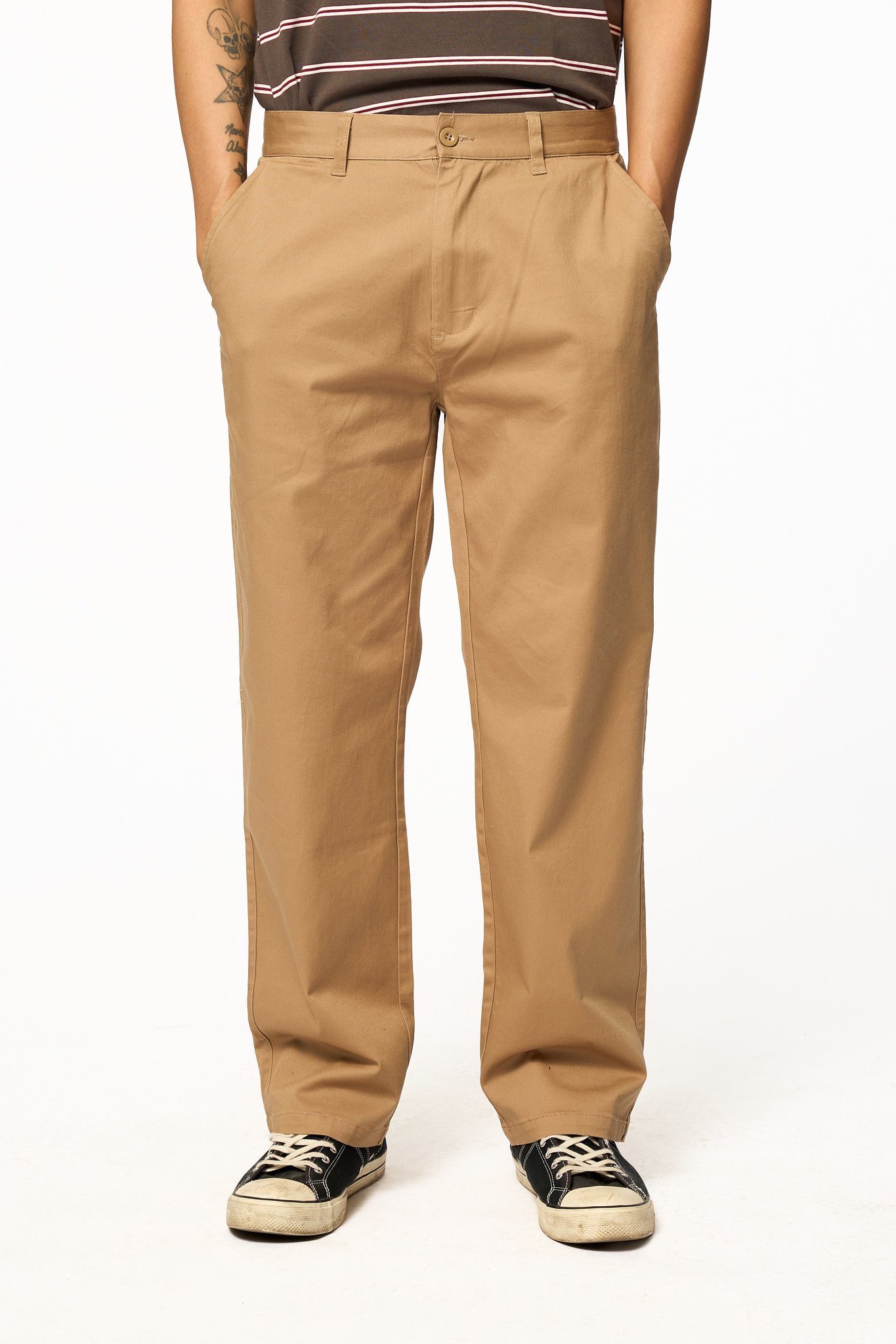 Khaki relaxed pants by The SellOut front view