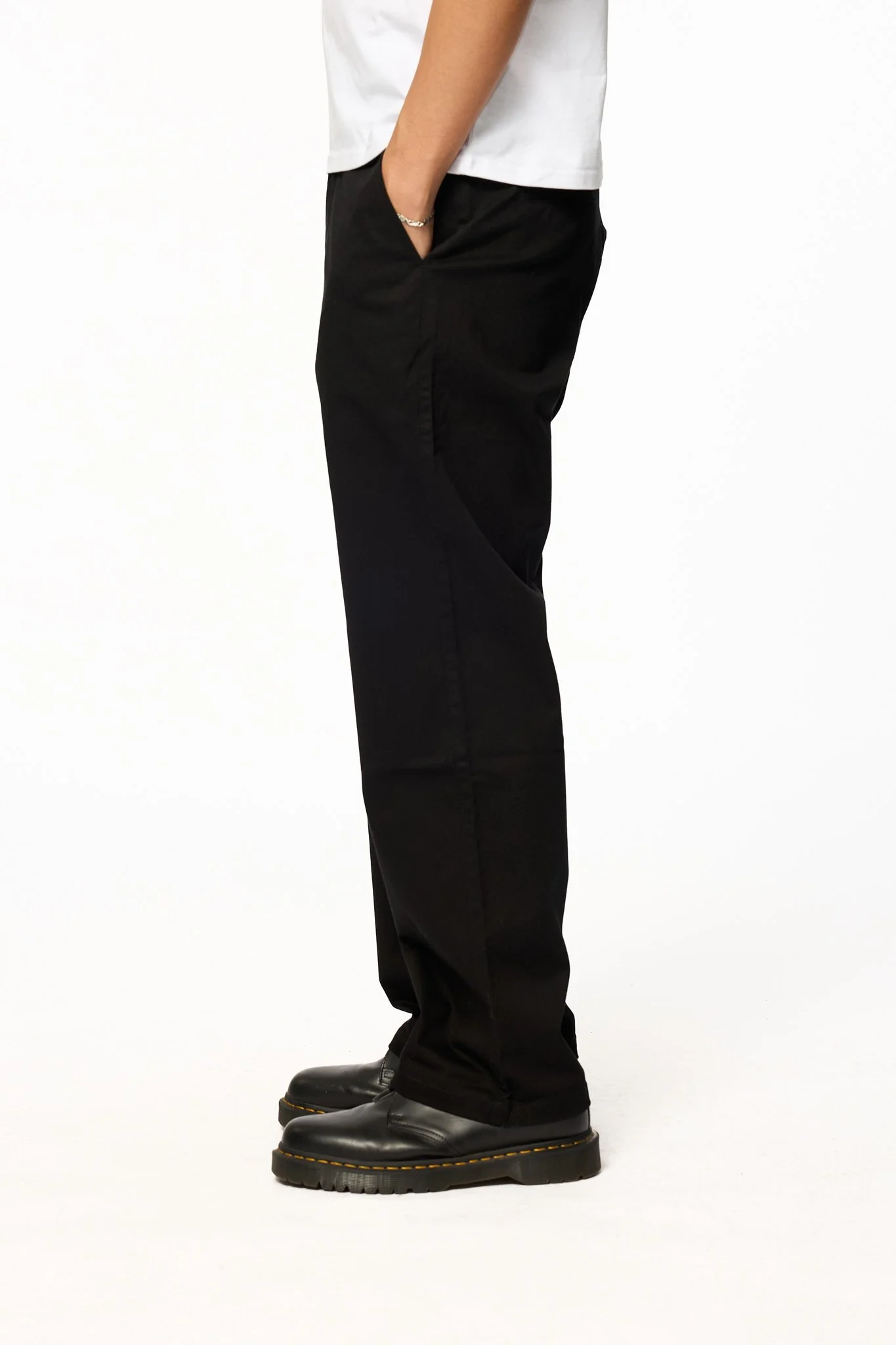 Black relaxed pants side view