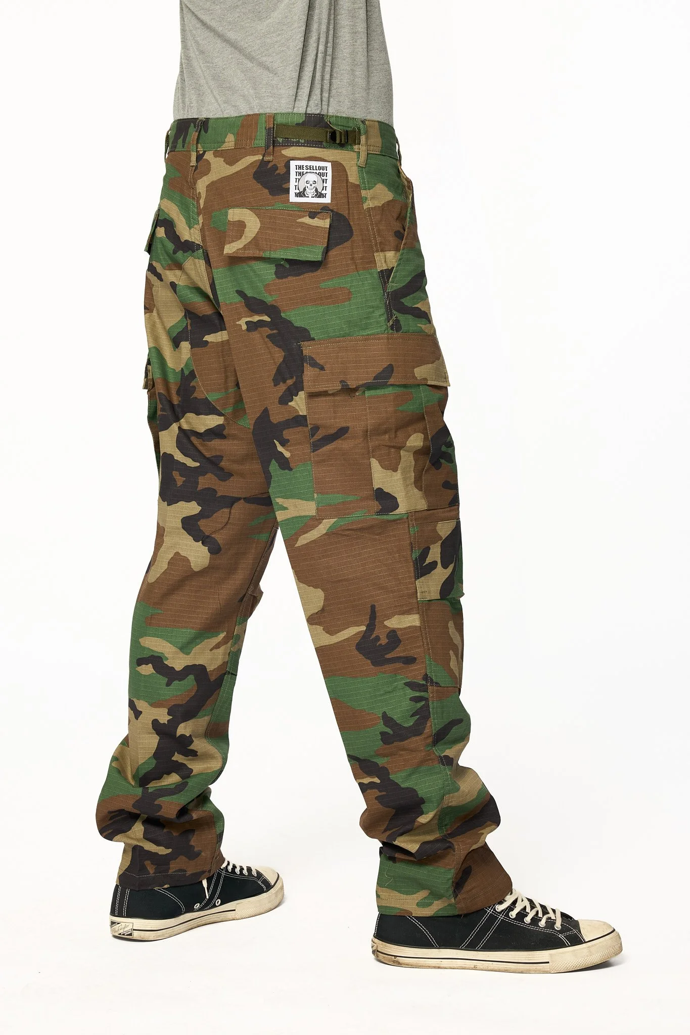 Vintage wash camo cargo pants side profile showing relaxed fit and cargo pocket