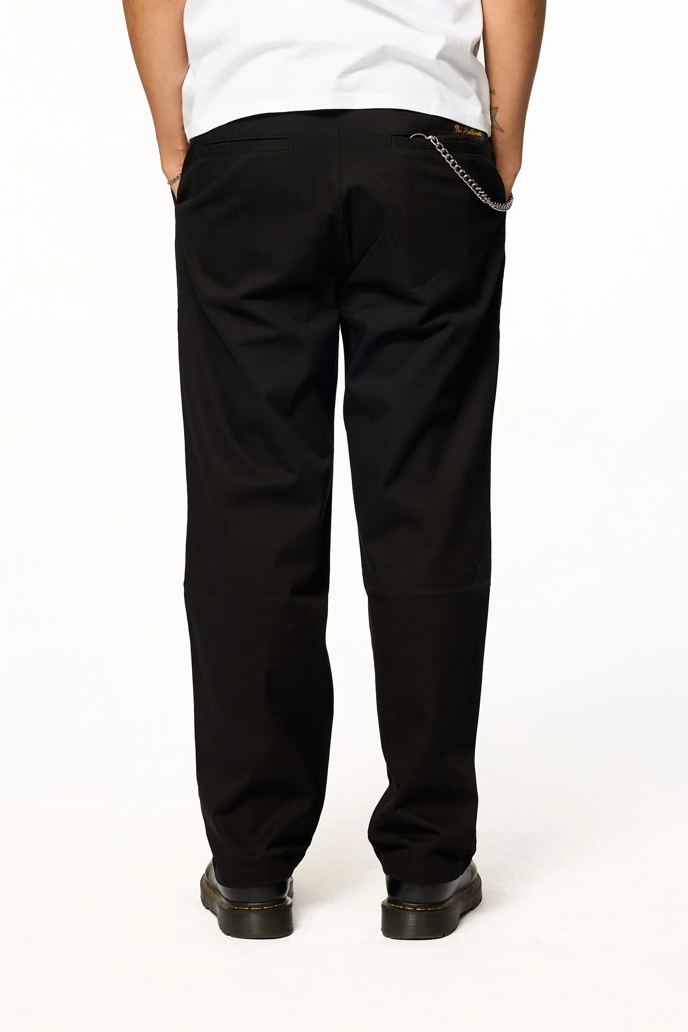 Black relaxed pants back view