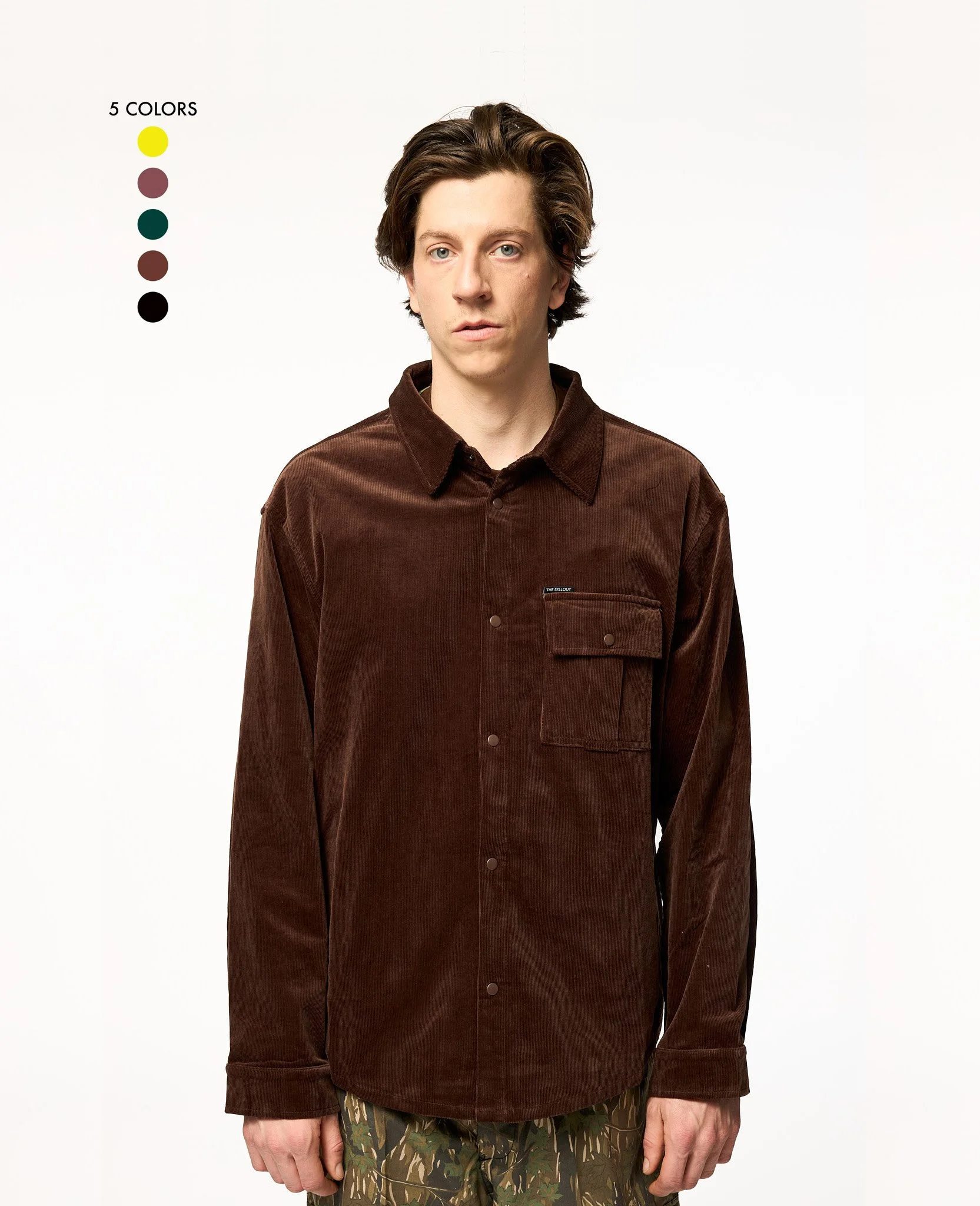 Oversized brown corduroy shirt jacket front view showing relaxed fit