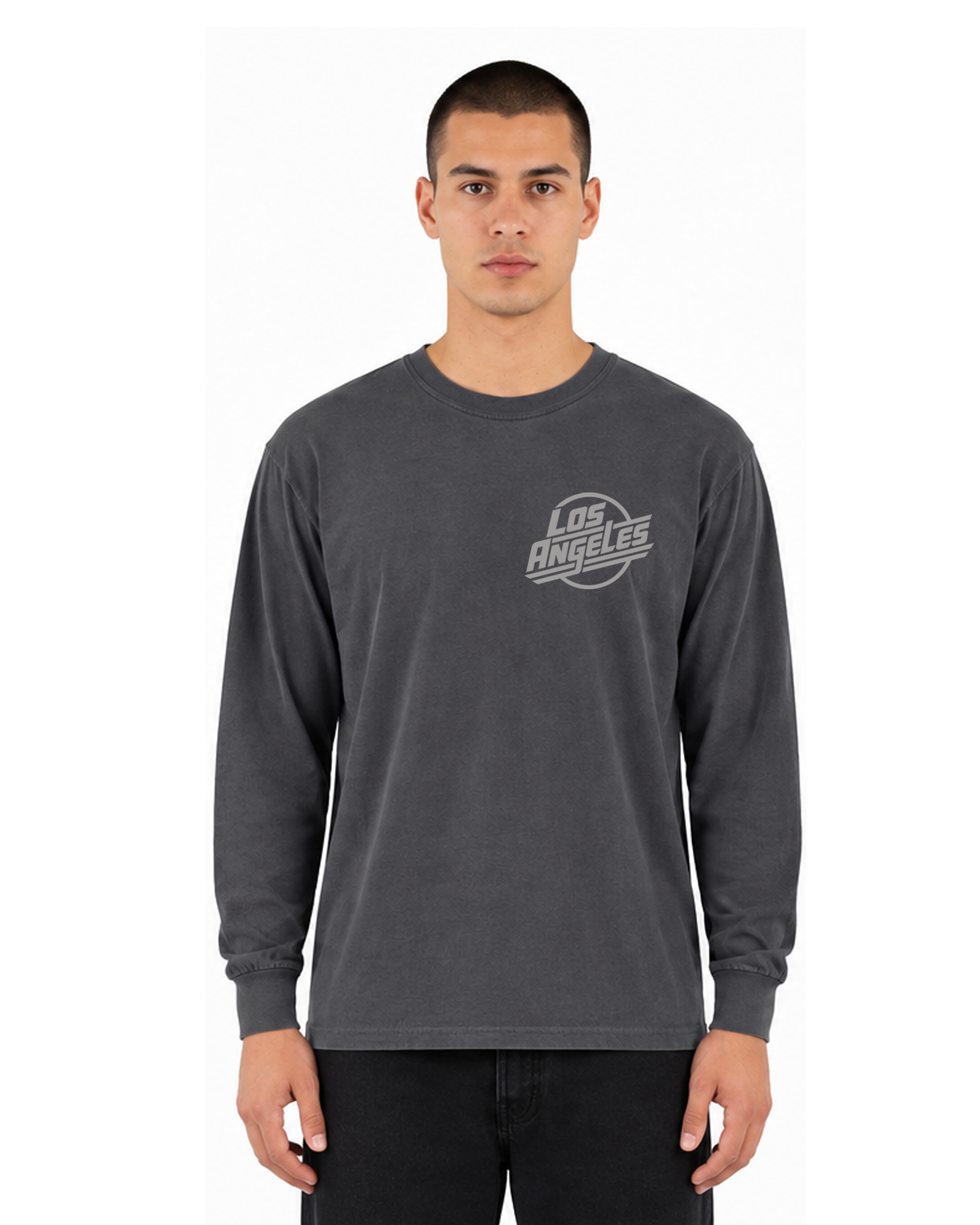 Male model wearing The SellOut Los Angeles Logo Long Sleeve Tee in vintage wash graphite, front view