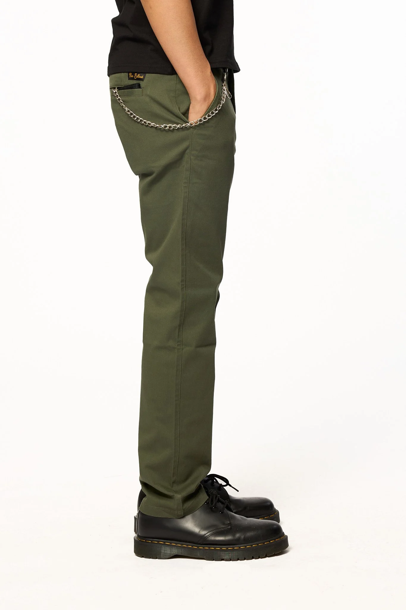 Green straight-leg pants with chain detail side view