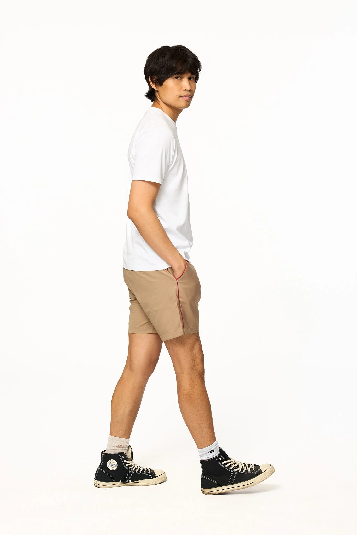 Khaki piped shorts side profile showing fit and contrast piping
