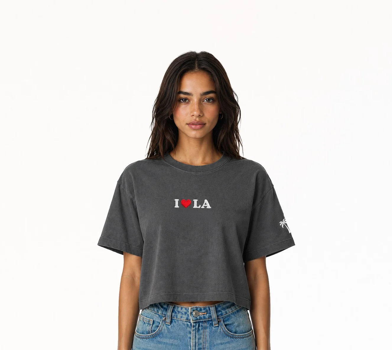 Female model wearing faded black I ❤️ LA cropped T-shirt by The SellOut