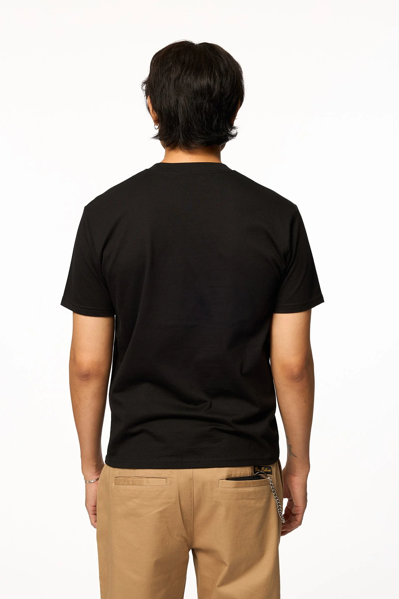 Khaki relaxed pants back view