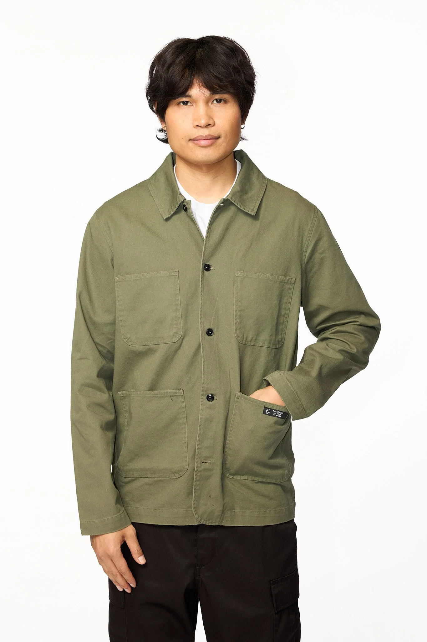 Green utility chore jacket front view showing button closure and pocket layout