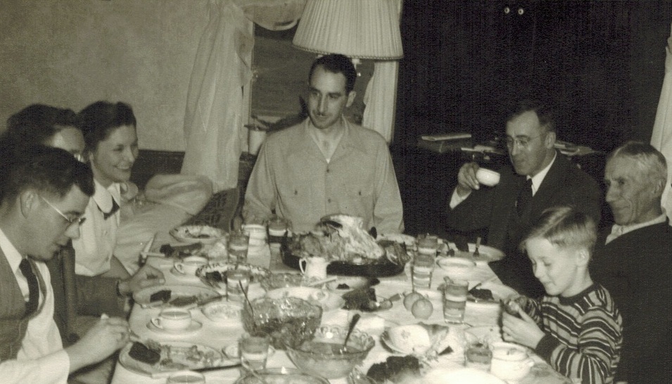 My handsome Uncle Wayne and family at a Thanksgiving table in the late 1940s.