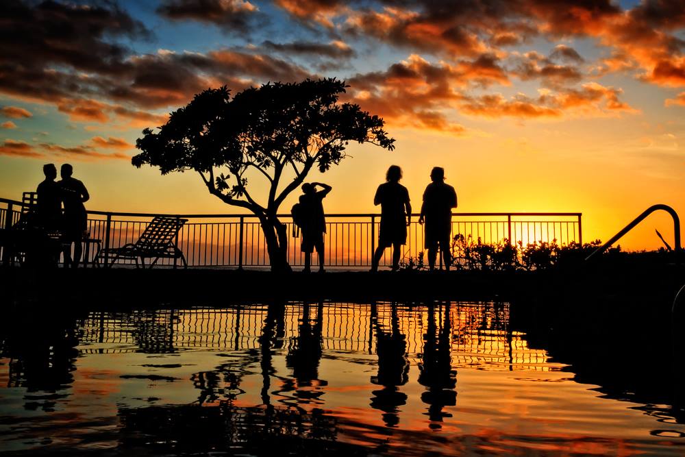 Puttering at sunset in Poipu Beach, by Avi Nahum.