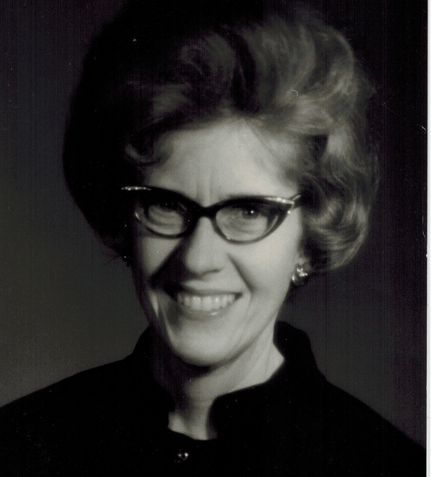 One of Mom's favorite photos taken by my Dad for her music teaching publicity - I love the 1960s hairdo.