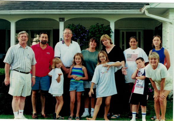 A mid-1990s Dick Wink, on the left , with the families he inspired with humor and love.