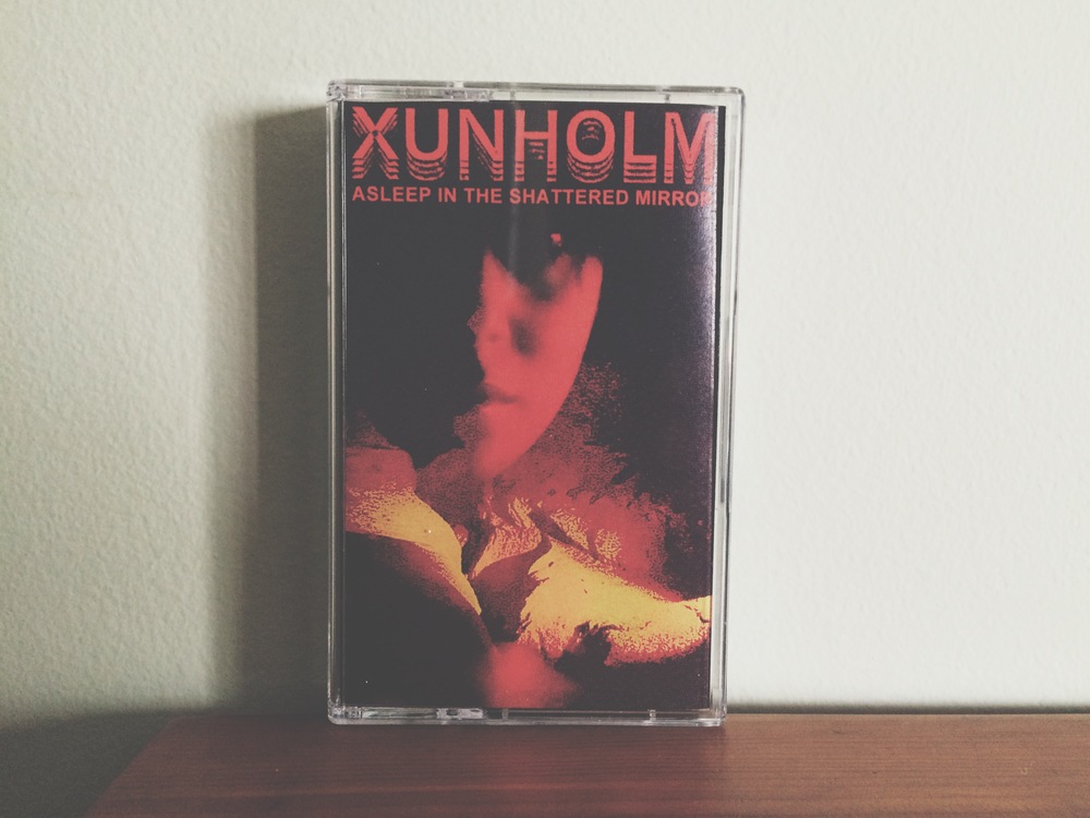 01. Xunholm - Asleep In The Shattered Mirror.jpg