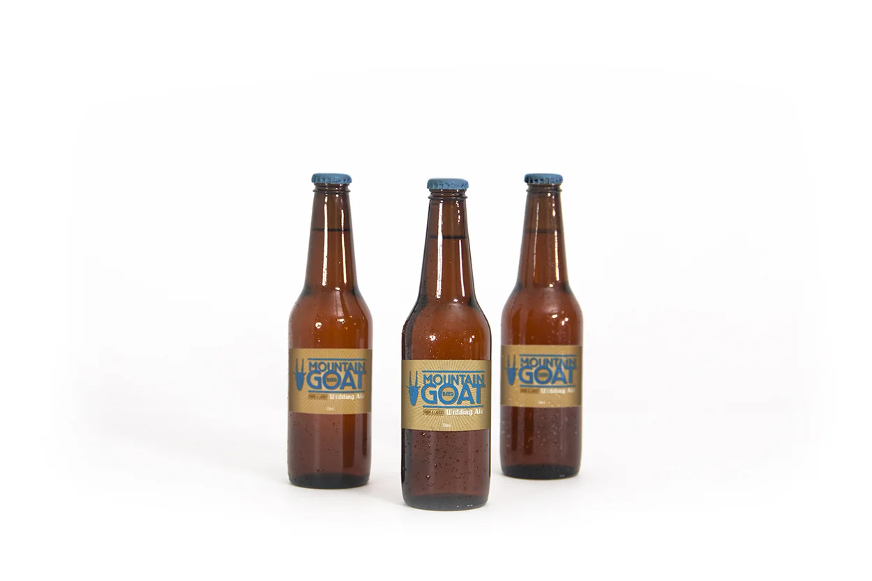 GOAT_Invite Beer Bottle Mockups_blue.jpg