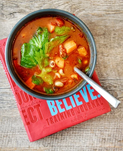 Things that make logging workouts more fun: a hot bowl of soup and a BELIEVE training log. 