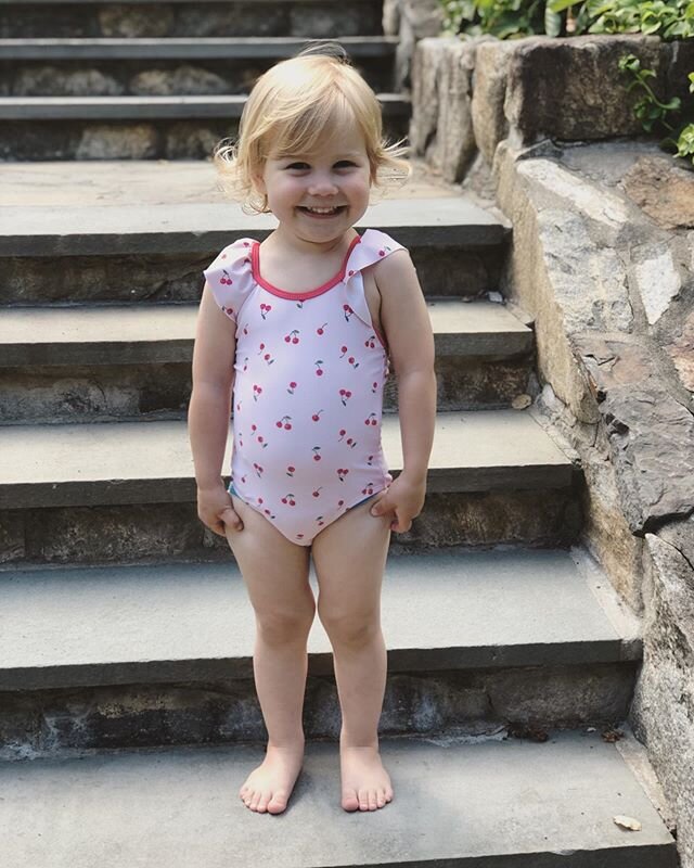 Here&rsquo;s Lizzy. She&rsquo;s almost 2 1/2 and she thinks these are tomatoes on her bathing suit. 🍒 New suit day because we heard the pool is going to open soon. It&rsquo;s actually the right around the normal opening schedule for most pools in up