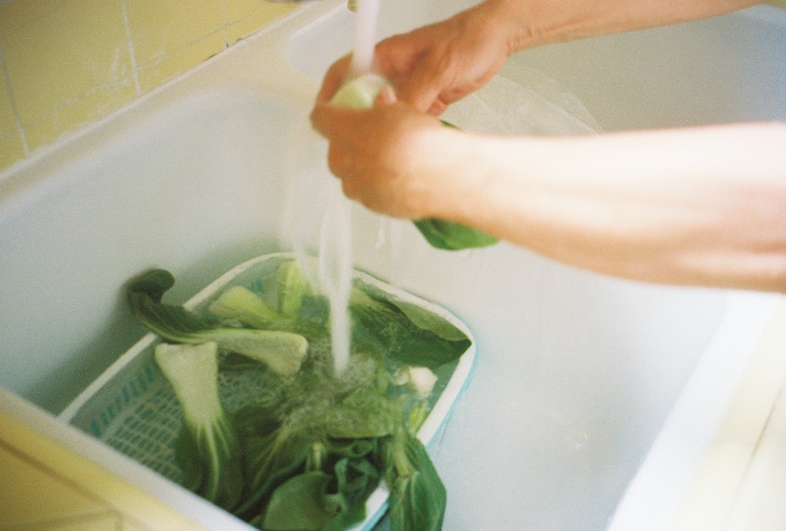 Person preparing vegetables