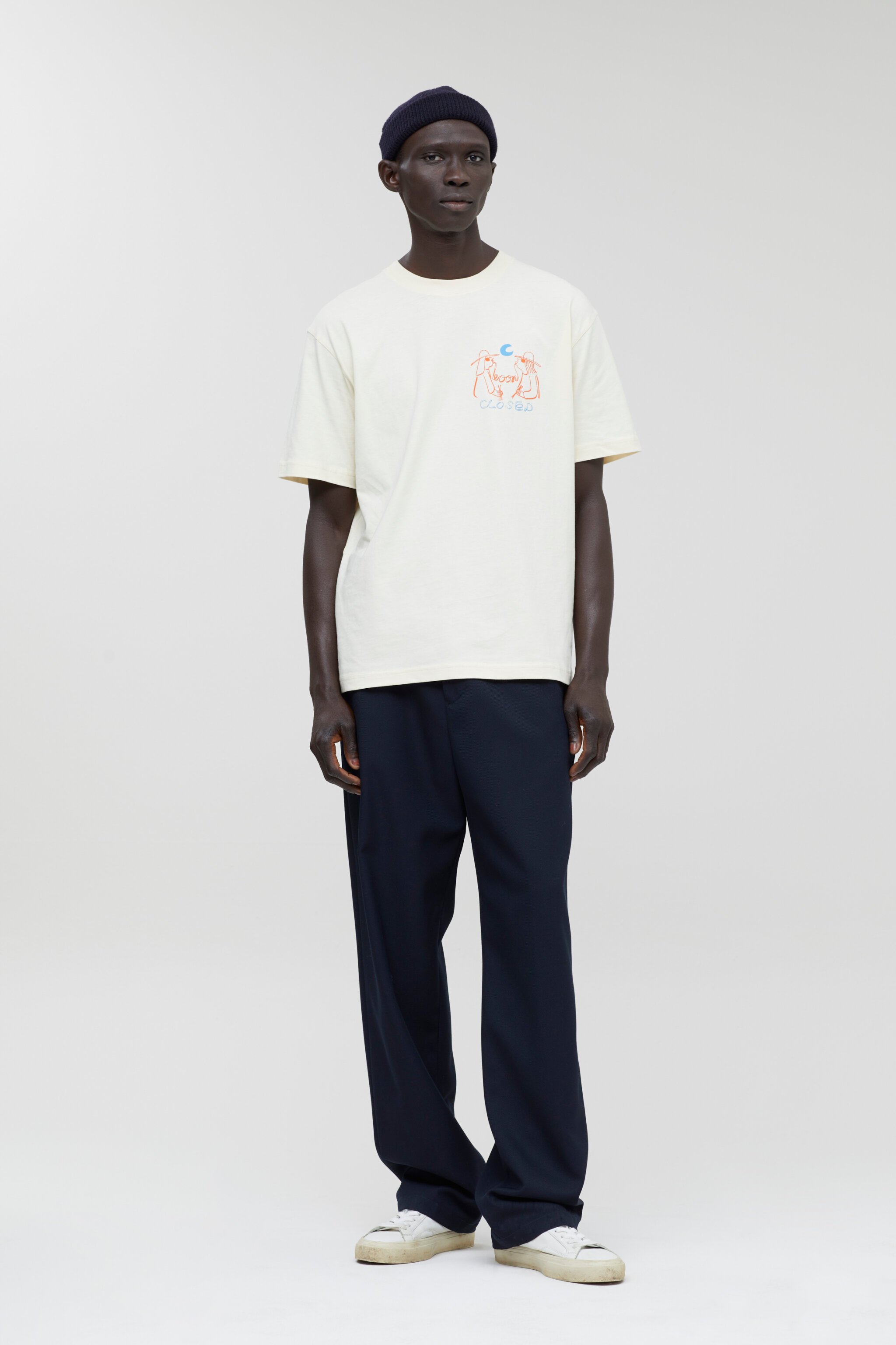 Person wearing an off-white t-shirt