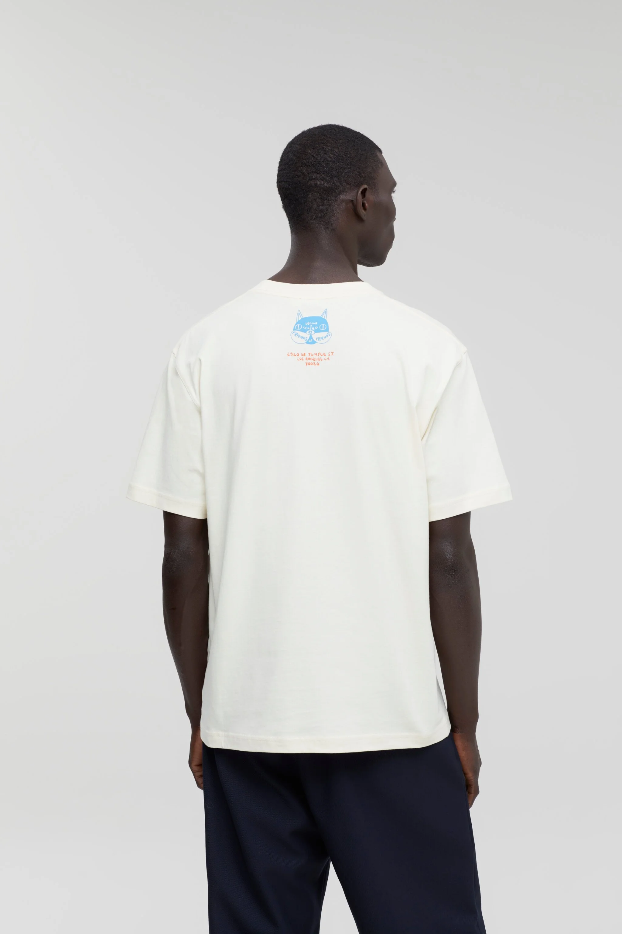 Person wearing an off-white t-shirt