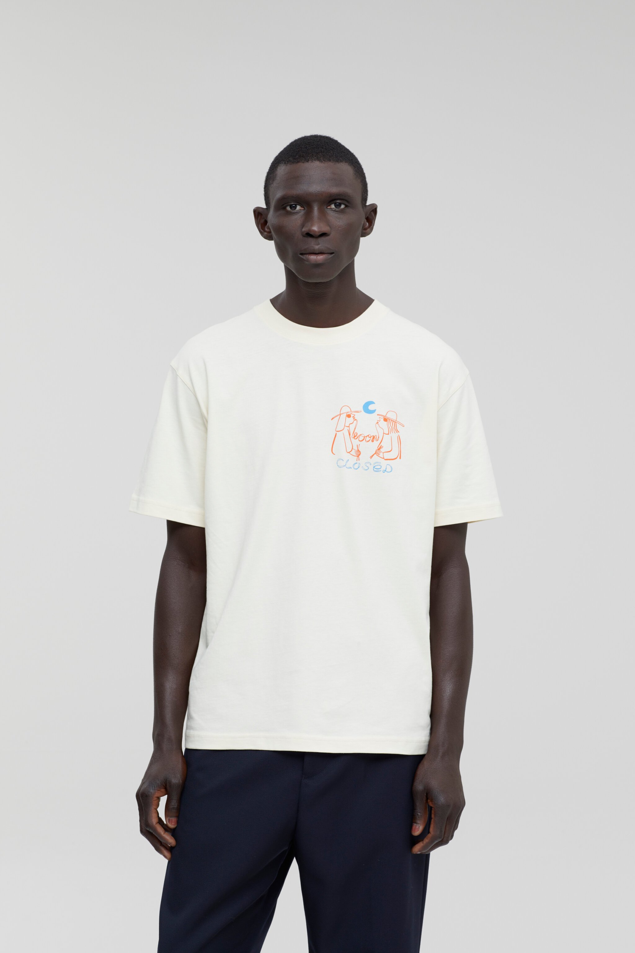 Person wearing an off-white t-shirt