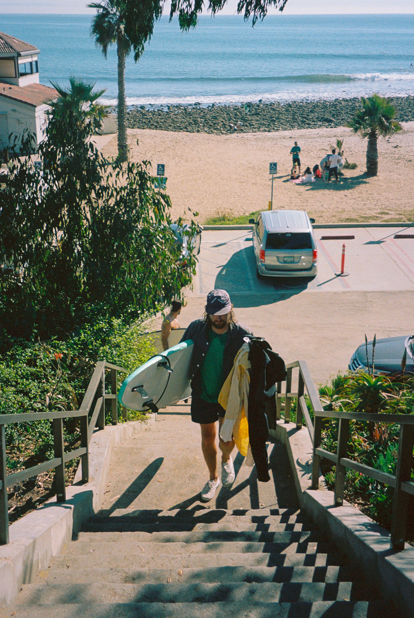 Surfers walking