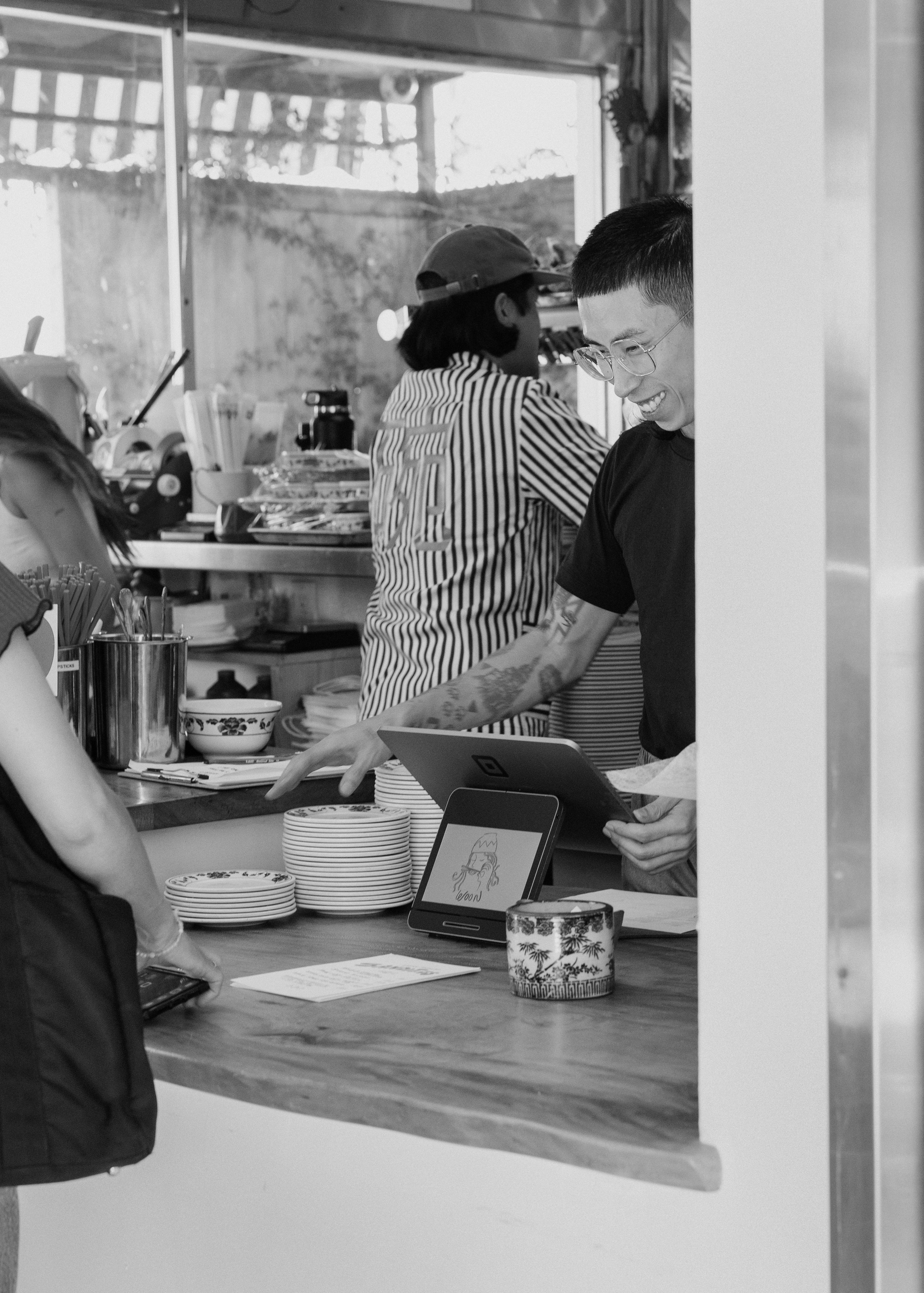 People working in a restaurant kitchen