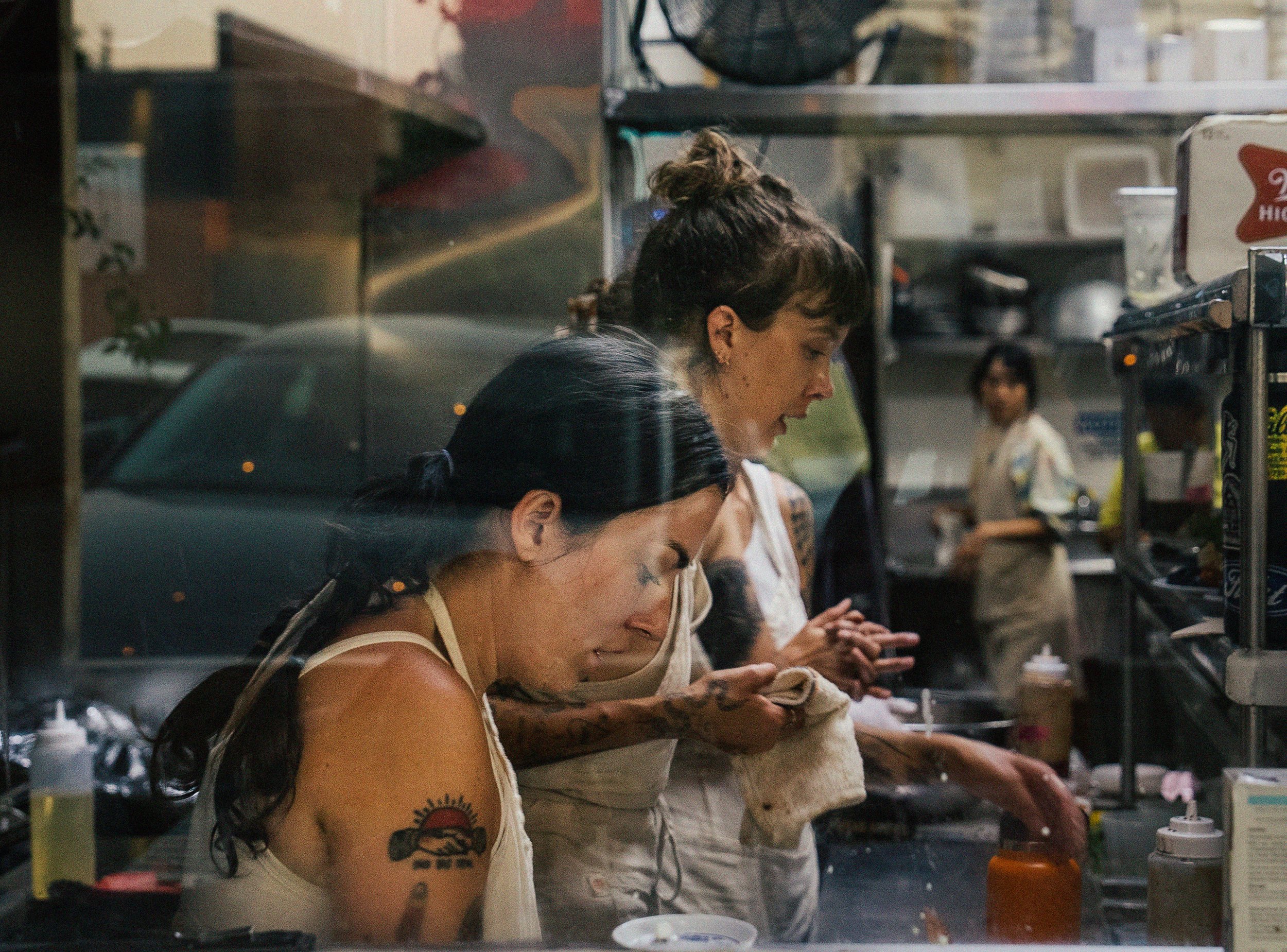 People working in a restaurant kitchen