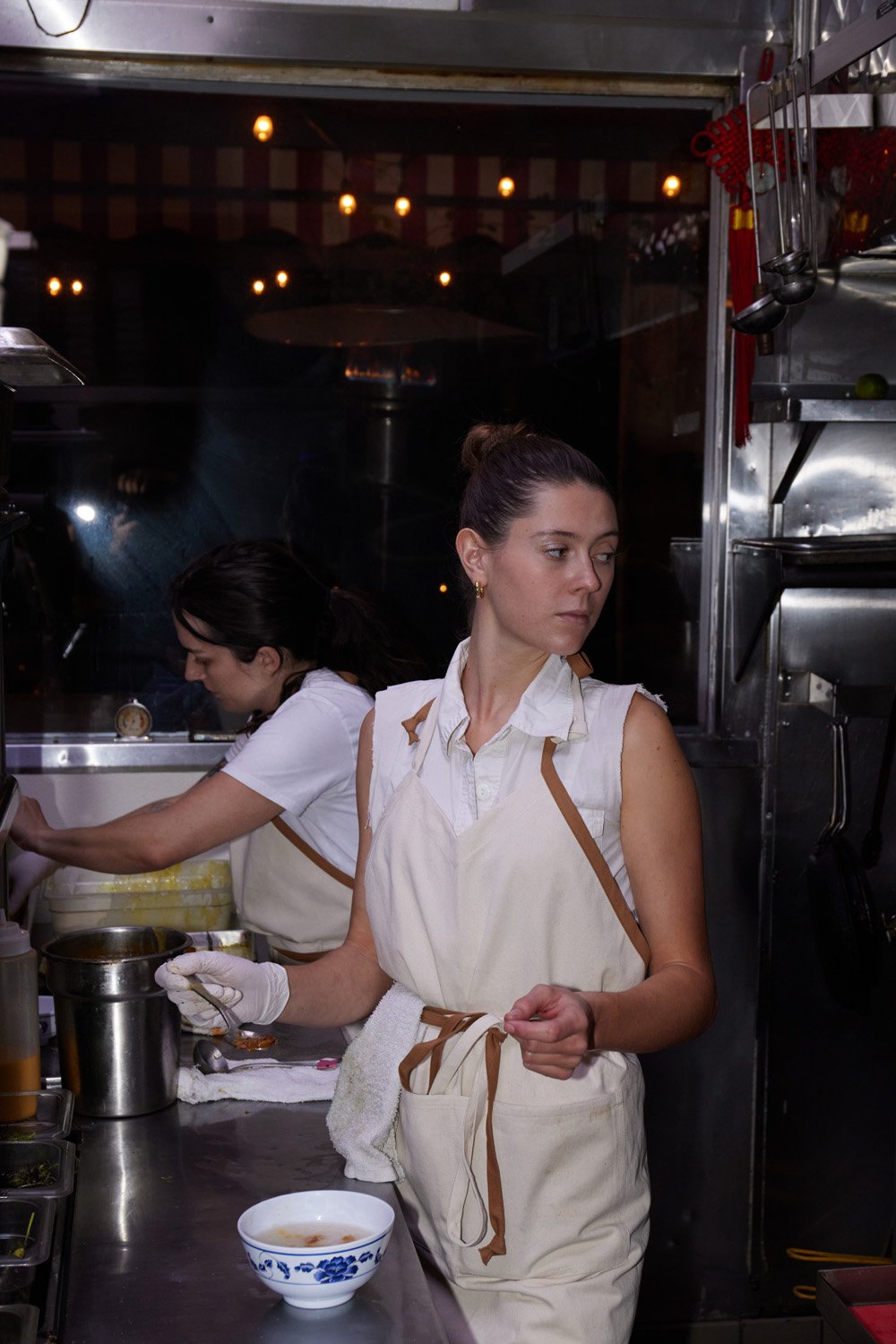 People working in a restaurant kitchen