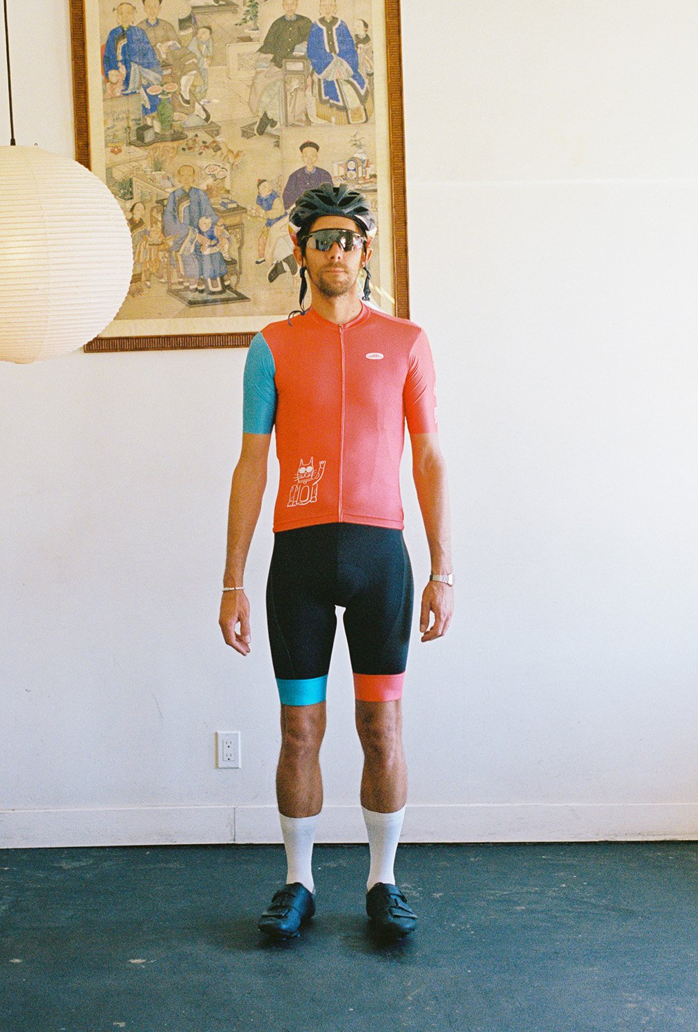 A man wearing a cycling uniform