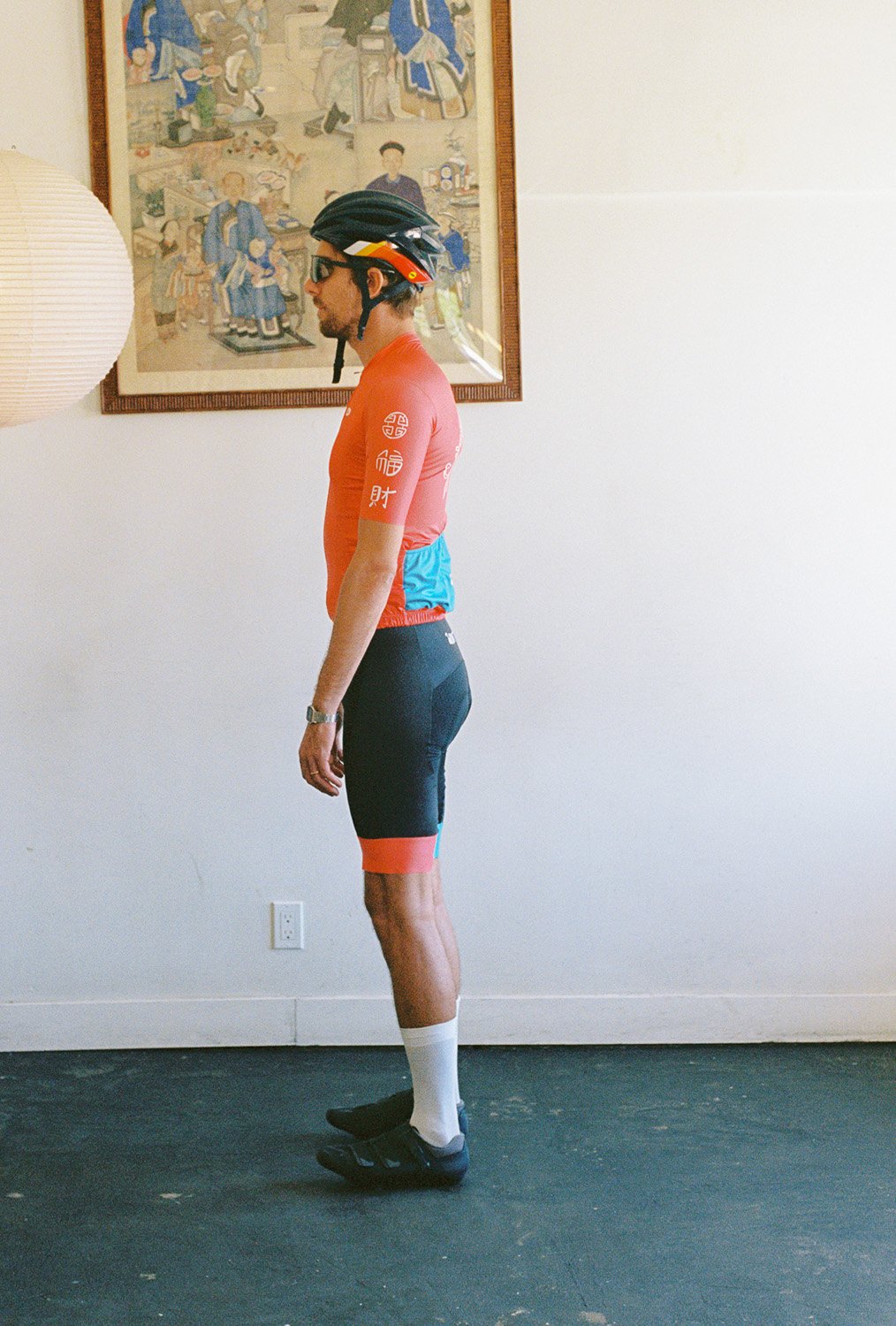 A man wearing a cycling uniform