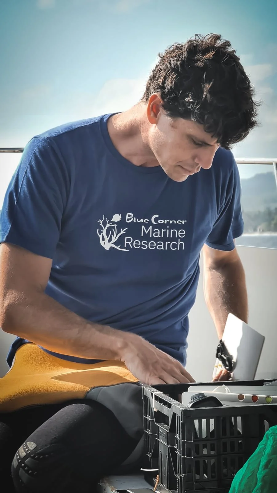 Andrew preparing gear on the boat.jpg
