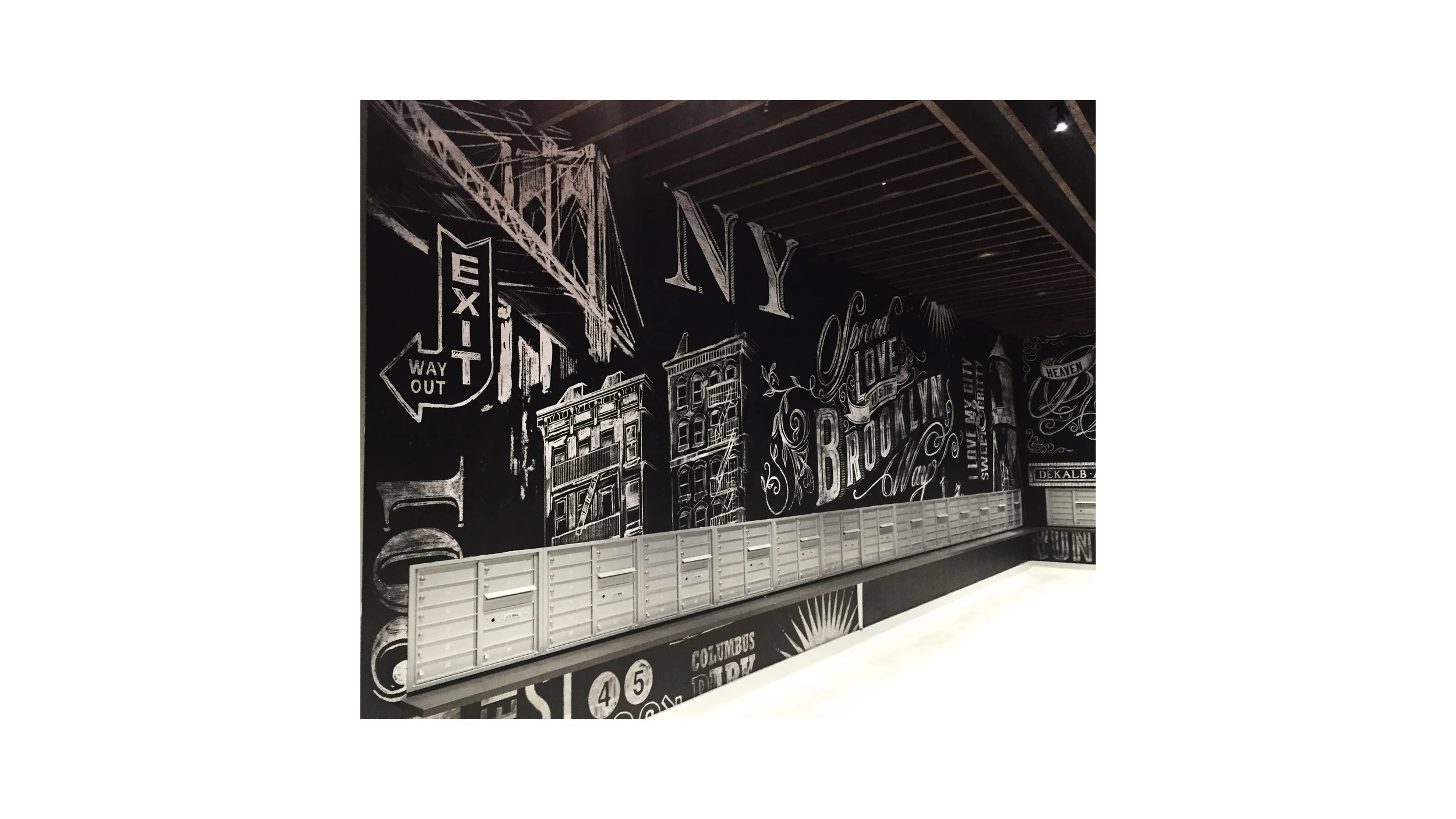 Custom chalk board graphics on vinyl wallcovering by Grand Image artist Cory Steffen celebrate Brooklyn past and present.